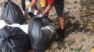 How to tie a trash bag for weighing and secure transfer during coastal cleanups