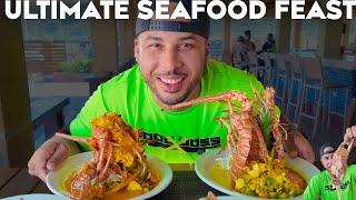 MASSIVE SEAFOOD FEAST OF KING CRAB LOBSTER AND FISH JAMAICA FOOD HISTORY AND CULTURE