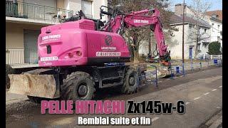 Pelle a pneu Hitachi ZX145w-6 Remblai suite et fin