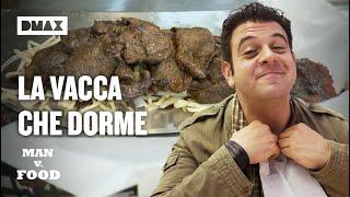 Adam Richman sfida la Vaca Acosta una montagna di carne patatine funghi e formaggio  Man vs Food