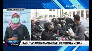 Kabut Asap di Kota Medan Anggota DPRD Bagikan Masker