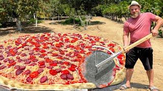 Giant Pizza cooked On Coals Cooking Show In Nature