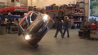 Incredible Stunt Driving...Car Drives on Two Wheels Thru a Shop 