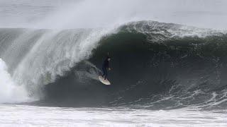 Surfer pulls into a CHAOTIC shallow barrel