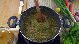 Pan shot of hands cooking Sarson ka saag on induction cooker -...  Indian Stock Footage  Knot9