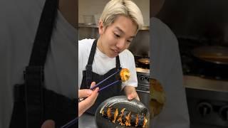 Ken makes a very spicy kimchi cheese kimbap…that he can barely handle 