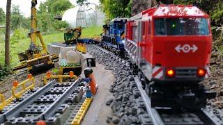 LEGO Cargo Train 60052 and 60098 - Underway to the new Water Dam in the Garden - Construction Pt. 13