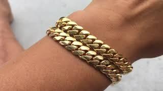 Two 14k 9mm 8” Miami Cuban link bracelets made by Limaxi jewelers and  Daniel Jewelry Inc