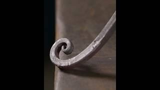 Organic shape forged with only a hammer #blacksmith #scroll #metalart