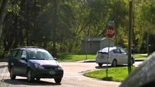 Cars running stop sign.