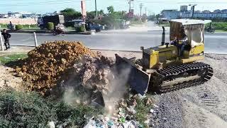 New start up road making with quick leveling skill bulldozer Komatsu D31P operator