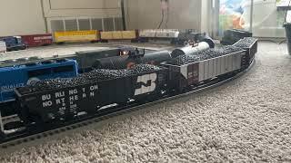 Lionel Burlington Northern SD40-2 pulling long coal train