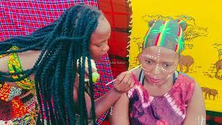 Talented Lady helps her friend get a traditional face painting