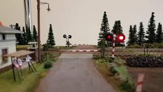 przejazd kolejowy z półzaporami i sygnalizacją świetlną