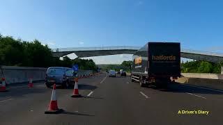 M1 Motorway southbound drive on a sunny day in 4K