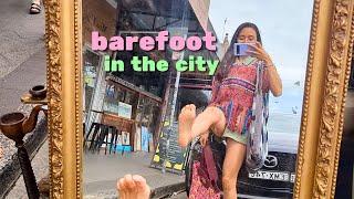 day without shoes barefoot shopping in the city