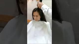 Women getting buzzcut for training