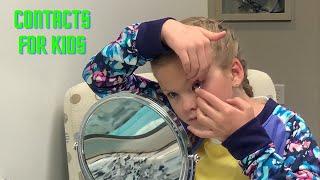 9 year old putting in contact lenses for the first time