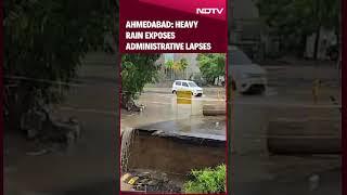 Ahmedabad Rain News  Heavy Rain in Ahmedabad Flooding Potholes Resurface On Roads