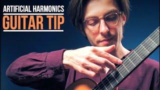 How to play artificial harmonics on guitar