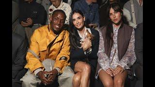 Demi Moore and dog Pilaf Micheal Ward sit front row at Dior in Paris