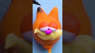 Grumpy never tasted so good  Garfield cake pop