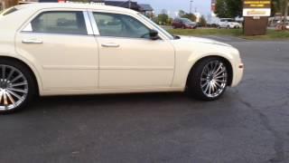 2006 Chrysler 300 sitting on 22 Versante 230 Chrome Wheels and 26535-22 Lexani Tires.