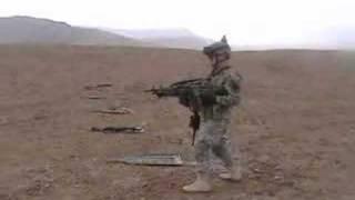 Army Soldier dual-wields some M249s