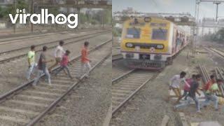 Friends Save Man with Foot Stuck in Train Tracks  ViralHog