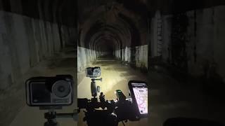 Cycling a disused railway tunnel at 2am  heard a bar being hit in one the side tunnels.