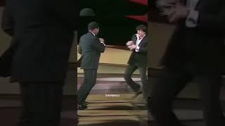 Muhammad Ali surprises Sylvester Stallone at the 1977 Oscars