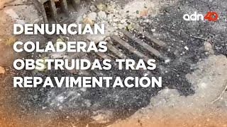 Vecinos denuncian coladeras obstruidas tras repavimentación en Eje 2 Norte y Eje Central en la CDMX