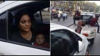 A car with woman Breastfeeding a baby inside towed away goes Viral on Social Media