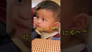 Cute baby watching momma eating bbq