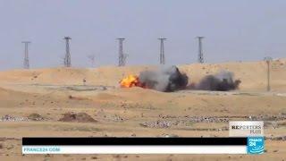 EXCLUSIVE - Syria Kurds destroy a suicide bombers truck filled with explosives coming at them