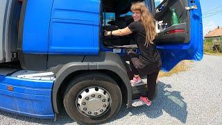 Young female truck drivers morning trucking routine