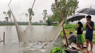 Unbelievable rainy day fishing video  Huge fish catching in flood water  Real village fishing
