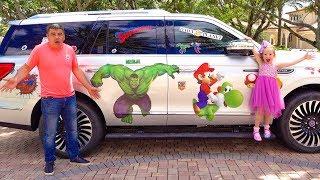 Nastya decorated papas car with superheroes