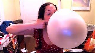 Blowing giant bubble gum bubbles with a whole roll of bubble tape