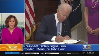 Biden signs gun control bill into law