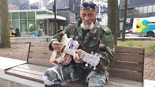 Guitar virtuoso plays acoustic Fender at Cabot Sqr. Montreal on May 9 2024 #guitarplayer