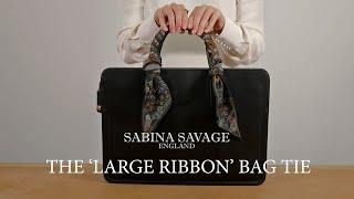 Sabina Savage Large Ribbon Twilly Scarf How to tie the Large Ribbon Bag Tie