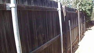 Wood Fence with Steel Posts and Brackets