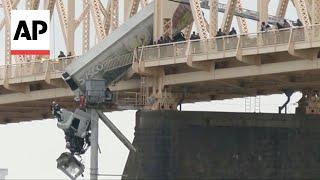 New dash cam video shows semi-truck driver nearly falling off Louisville bridge