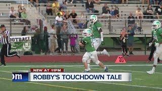 High school football manager with Down syndrome scores TD mother with terminal illness watches