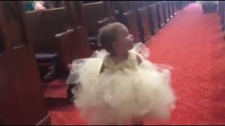 Bride and grooms daughter as flower girl...when she sees her daddy