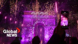 New Years 2023 Paris France gets the party started with fireworks smoke show over Arc de Triomphe