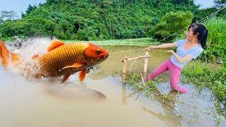 Girl fishing in the stormy weather caught a big fish