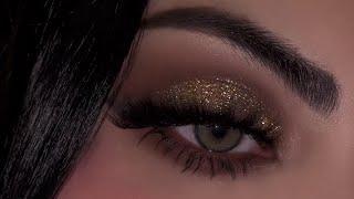Achieve this Golden glitter blown out smokey eye look in 5 minutes