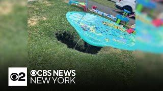 Toddler almost falls into sinkhole in New Jersey familys front yard